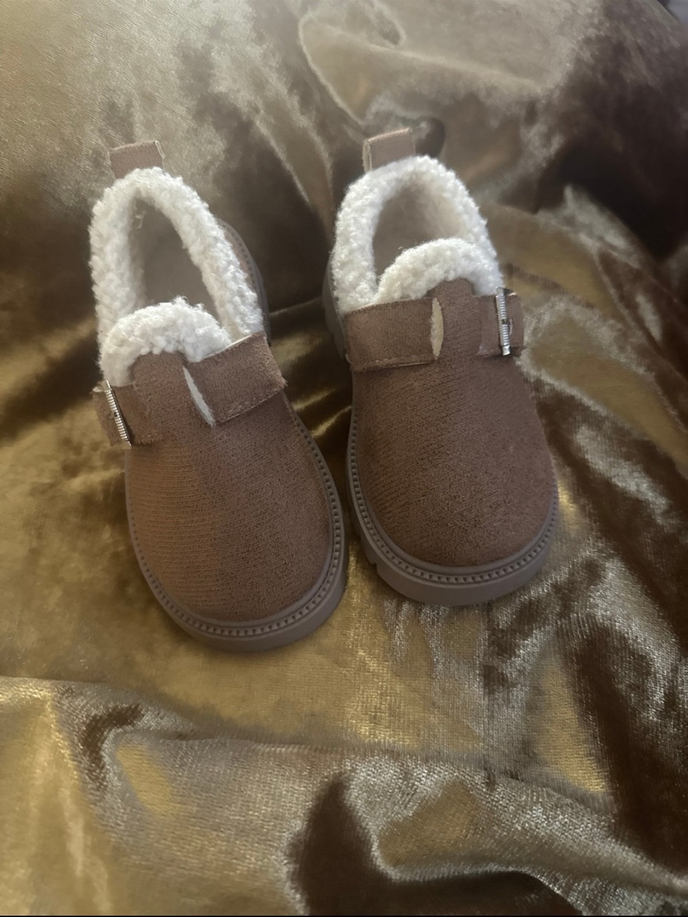 brown toddler or kids' slip-on winter shoes with a faux-shearling line size 10.5